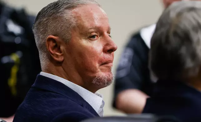 Colin Gray, the father of Apalachee High School shooting suspect Colt Gray, reacts after a jury convicted him of second-degree murder and involuntary manslaughter at Barrow County Courthouse in Winder, Ga., Tuesday, March 3, 2026. (Abbey Cutrer/Atlanta Journal-Constitution via AP, Pool)