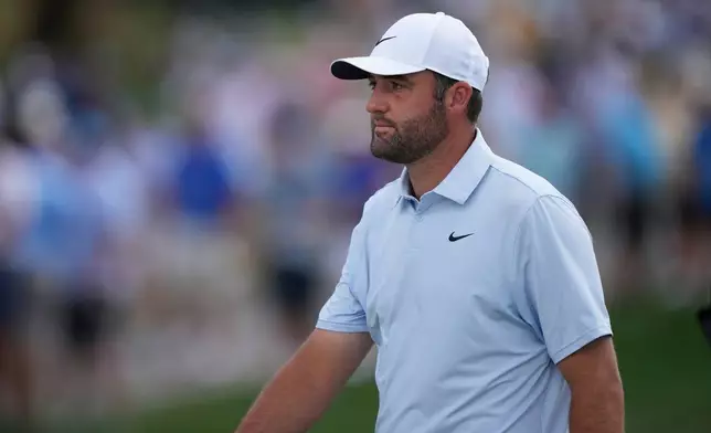 Scottie Scheffler walks on the first green during the second round of the Arnold Palmer Invitational at Bay Hill golf tournament Friday, March 6, 2026, in Orlando, Fla. (AP Photo/Matt Slocum)
