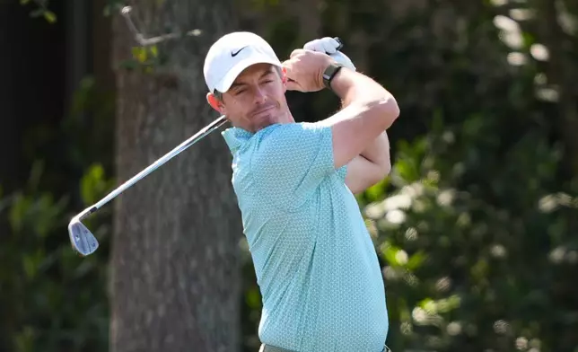 Rory McIlroy, of Northern Ireland, reacts while hitting practice shots during a practice round for The Players Championship golf tournament Wednesday, March 11, 2026, in Ponte Vedra Beach, Fla. (AP Photo/Gerald Herbert)