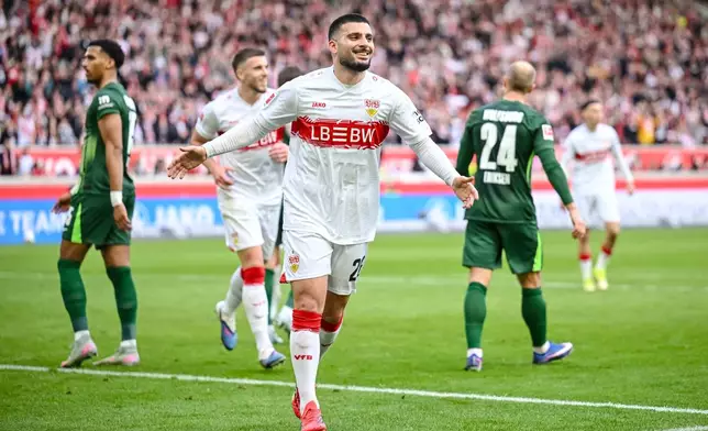 Stuttgart's Deniz Undav celebrates after scoring during the German Bundesliga soccer match between VfB Stuttgart and VfL Wolfsburg in Stuttgart, Germany, Sunday, March 1, 2026. (Harry Langer/dpa via AP)