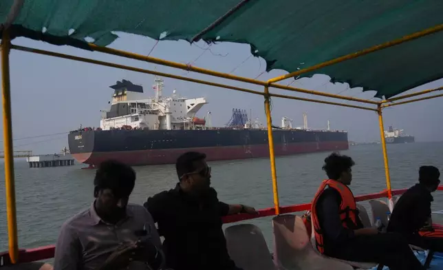 FILE - Liberia-flagged tanker Shenlong Suezmax, carrying crude oil from Saudi Arabia, that arrived clearing the Strait of Hormuz, is seen at the Mumbai Port in Mumbai, India, Thursday, March 12, 2026. (AP Photo/Rafiq Maqbool, file)