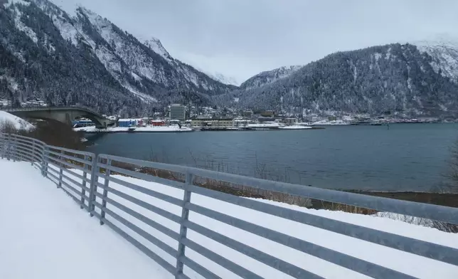 The downtown area of Alaska's capital, Juneau, a city accessible only by air or water and where ballots from elections are sent for tabulations and certification, is seen across Gastineau Channel from Douglas Island, Alaska, March 19, 2026. (AP Photo/Becky Bohrer)