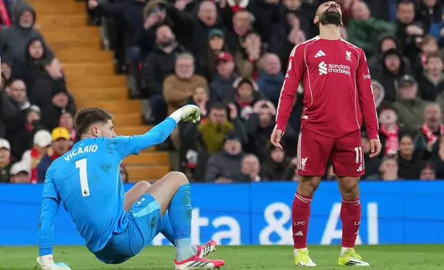 Liverpool's Mohamed Salah reacts during the Premier League soccer match between Liverpool and Tottenham in Liverpool, England, Sunday, March 15, 2026. (AP Photo/Jon Super)