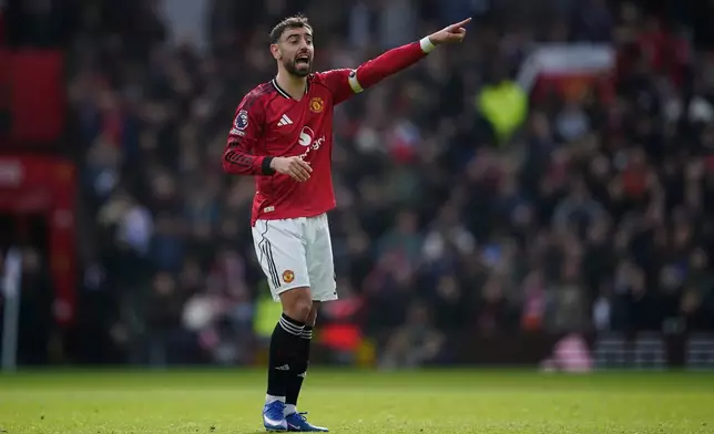 Manchester United's Bruno Fernandes reacts during the Premiier League soccer match between Manchester United and Aston Villa in Manchester, England, Sunday, March 15, 2026. (AP Photo/Dave Thompson)