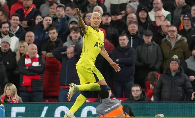 Tottenham's Richarlison celebrates after scoring during the Premier League soccer match between Liverpool and Tottenham in Liverpool, England, Sunday, March 15, 2026. (AP Photo/Jon Super)