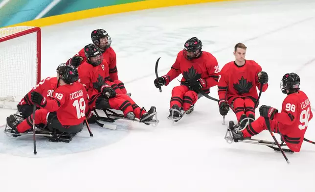 Canada's players reacts after loosing the ice hockey gold medal match between United States and Canada at the 2026 Winter Paralympics, in Milan, Italy, Sunday, March 15, 2026. (AP Photo/Antonio Calanni)
