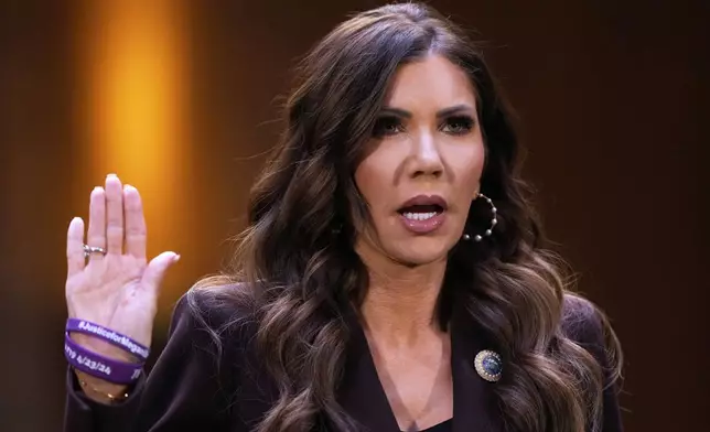 Homeland Security Secretary Kristi Noem is sworn in before appearing for an oversight hearing before the Senate Judiciary Committee, at the Capitol in Washington, Tuesday, March 3, 2026. (AP Photo/J. Scott Applewhite)