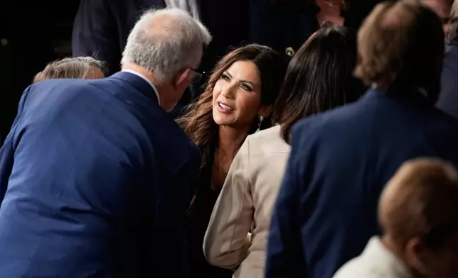 Homeland Security Secretary Kristi Noem is seen before President Donald Trump delivers the State of the Union address to a joint session of Congress in the House chamber at the U.S. Capitol in Washington, Tuesday, Feb. 24, 2026. (AP Photo/Alex Brandon)
