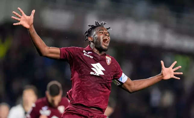 Torino's Duvan Zapata celebrates after scoring their fourth goal during the Serie A soccer match between Torino FC and Parma, Friday, March 13, 2026, in Turin, Italy. (Fabio Ferrari/LaPresse via AP)