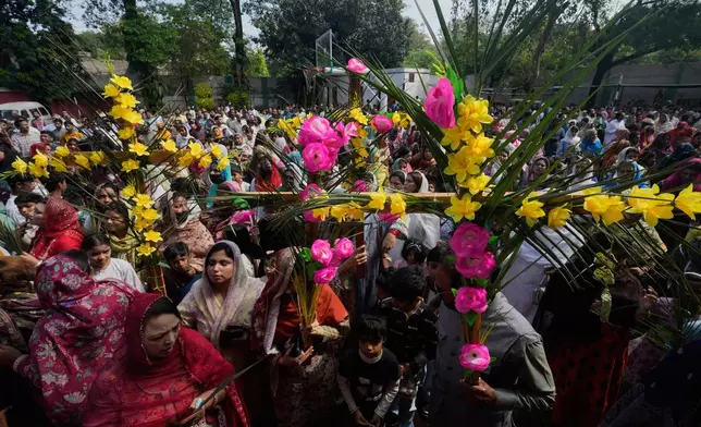 Pakistani Christians attend a Palm Sunday Mass at St. Anthony Church in Lahore, Pakistan, Sunday, March 29, 2026. (AP Photo/K.M. Chaudary)