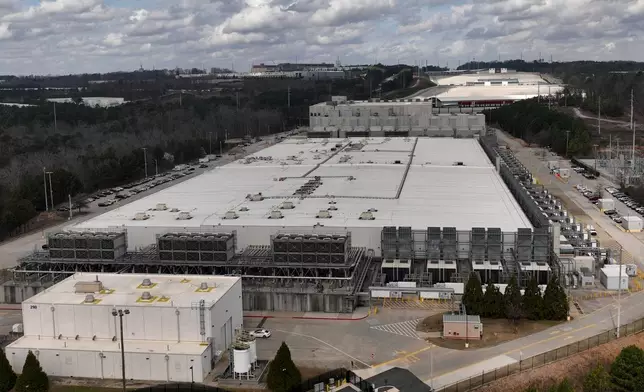 FILE - The Douglas County Google Data Center complex is visible, March 6, 2026, in Lithia Springs, Ga. (AP Photo/Mike Stewart, File)