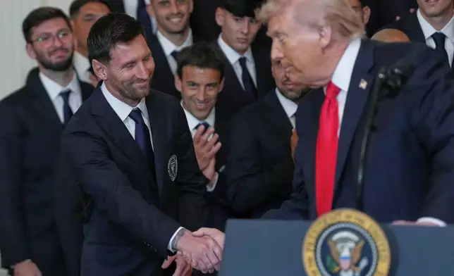 President Donald Trump shakes hands with Lionel Messi during an event to honor the 2025 Major League Soccer champions Inter Miami in the East Room of the White House, Thursday, March 5, 2026, in Washington. (AP Photo/Julia Demaree Nikhinson)