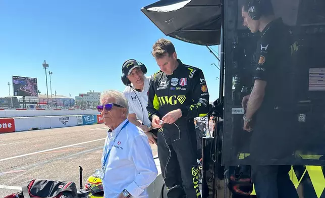 Will Power watches the IndyCar race on pit lane after hitting the wall in his debut for Andretti Global on Sunday, March 1, 2026 in St. Petersburg, Fla. (AP Photo/Jenna Fryer)