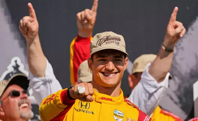 FILE - Alex Palou celebrates after winning the IndyCar championship Sunday, Aug. 31, 2025, at Nashville Superspeedway in Lebanon, Tenn. (AP Photo/George Walker IV, File)