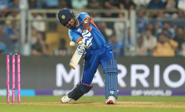 India's Sanju Samson plays a shot during the T20 World Cup cricket semi-final match between India and England in Mumbai, India, Thursday, March 5, 2026. (AP Photo/Rafiq Maqbool)