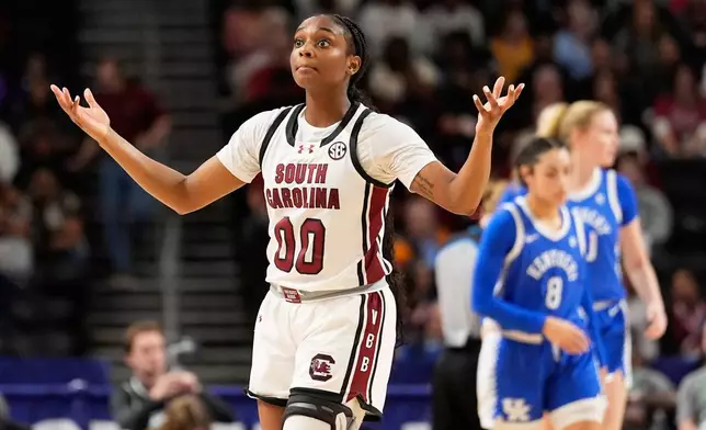South Carolina guard Ta'niya Latson reacts during first half of an NCAA college basketball game against Kentucky in the quarterfinals of the Southeastern Conference tournament, Friday, March 6, 2026, in Greenville, S.C. (AP Photo/Chris Carlson)