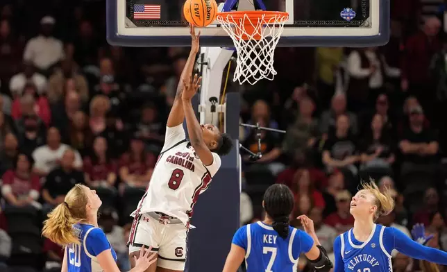 South Carolina forward Joyce Edwards shoots over Kentucky during first half of an NCAA college basketball game in the quarterfinals of the Southeastern Conference tournament, Friday, March 6, 2026, in Greenville, S.C. (AP Photo/Chris Carlson)