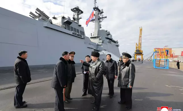 In this photo provided by the North Korean government, its leader Kim Jong Un, center, inspects new destroyer, Choe Hyon ahead of its commissioning at a shipyard in Nampo, North Korea Tuesday, March 3, 2026. Independent journalists were not given access to cover the event depicted in this image distributed by the North Korean government. The content of this image is as provided and cannot be independently verified. Korean language watermark on image as provided by source reads: "KCNA" which is the abbreviation for Korean Central News Agency. (Korean Central News Agency/Korea News Service via AP)
