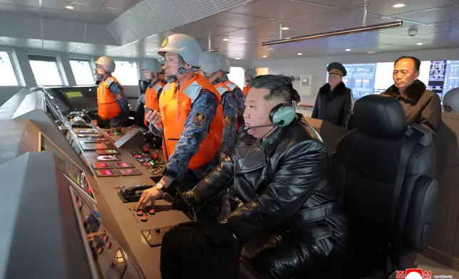 In this photo provided by the North Korean government, its leader Kim Jong Un, foreground, attends a sea trial of new destroyer, Choe Hyon ahead of its commissioning Tuesday, March 3, 2026. Independent journalists were not given access to cover the event depicted in this image distributed by the North Korean government. The content of this image is as provided and cannot be independently verified. Korean language watermark on image as provided by source reads: "KCNA" which is the abbreviation for Korean Central News Agency. (Korean Central News Agency/Korea News Service via AP)