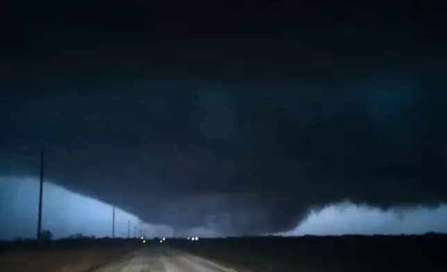 This image taken from video provided by the Fairview, Okla., Emergency Management shows a severe weather system west of Fairview, Okla., late Thursday, March 5, 2026. (Danny Giager/ Fairview Emergency Management via AP)