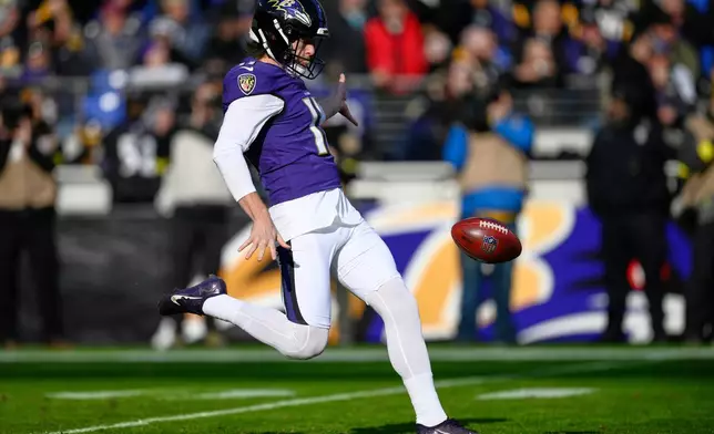 FILE - Baltimore Ravens punter Jordan Stout in action during the first half of an NFL football game against the Pittsburgh Steelers, Dec. 7, 2025, in Baltimore. (AP Photo/Nick Wass, file)