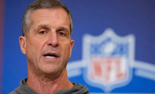 New York Giants head coach John Harbaugh speaks during a press conference at the NFL football scouting combine in Indianapolis, Tuesday, Feb. 24, 2026. (AP Photo/Michael Conroy)