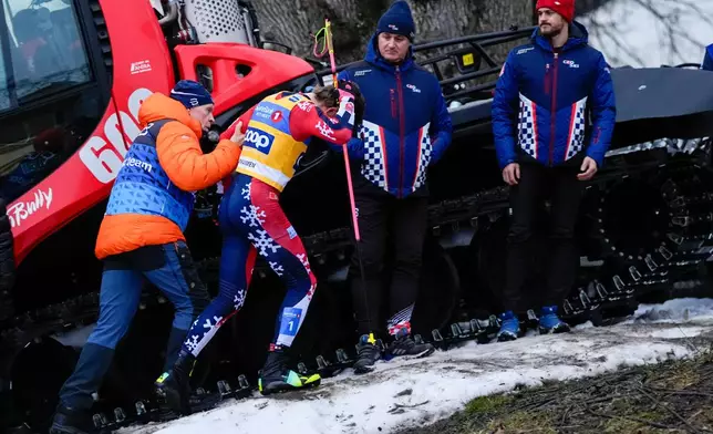 Norway's Johannes Hoesflot Klaebo, second from left, reacts after a fall during the World Cup sprint cross-country race in Drammen, Norway, Thursday March 12, 2026. (Lise Aserud/NTB Scanpix via AP)