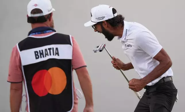 Akshay Bhatia, right, reacts after winning his playoff against Daniel Berger at the Arnold Palmer Invitational at Bay Hill golf tournament Sunday, March 8, 2026, in Orlando, Fla. (AP Photo/Matt Slocum)