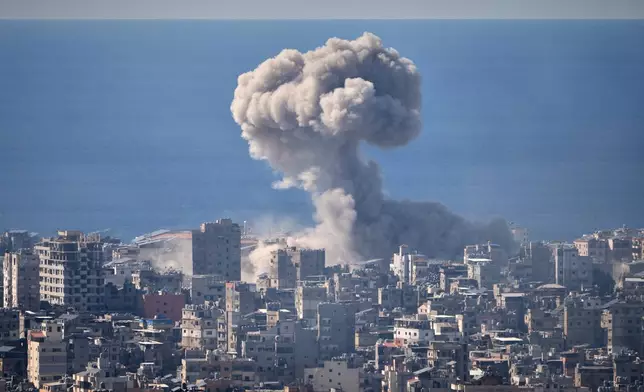 FILE - Smoke rises from an Israeli airstrike in Dahiyeh, Beirut's southern suburbs, March 9, 2026. (AP Photo/Hassan Ammar, File)