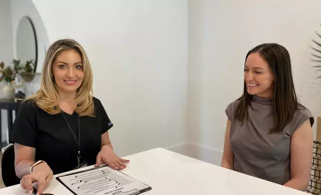 A MySpaLive injector conducts a comprehensive in-home consultation, reviewing medical history and confirming Good Faith Examination details prior to treatment to ensure continued safety and regulatory compliance.