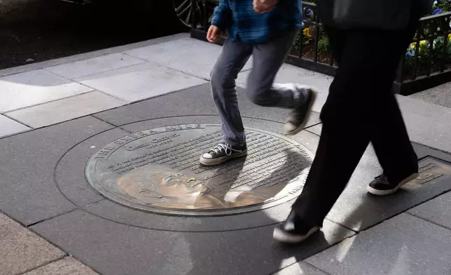 A marker in honor of César Chavez along the Points of Light: Volunteer Pathway on Thursday, March 19, 2026, in Washington. (AP Photo/Allison Robbert)