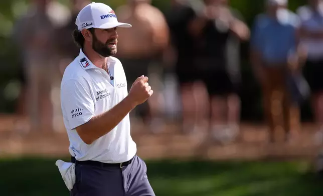 Cameron Young reacts after a putt on the ninth green during the third round of The Players Championship golf tournament Saturday, March 14, 2026, in Ponte Vedra Beach, Fla. (AP Photo/Gerald Herbert)