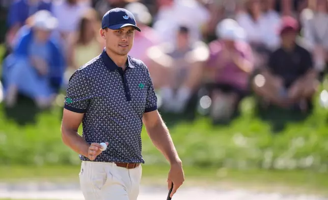 Ludvig Aberg of Sweden reacts after a birdie on the ninth green during the third round of The Players Championship golf tournament Saturday, March 14, 2026, in Ponte Vedra Beach, Fla. (AP Photo/Gerald Herbert)