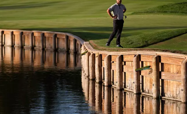 Xander Schauffele looks on on the 16th fairway during the third round of The Players Championship golf tournament Saturday, March 14, 2026, in Ponte Vedra Beach, Fla. (AP Photo/Gerald Herbert)