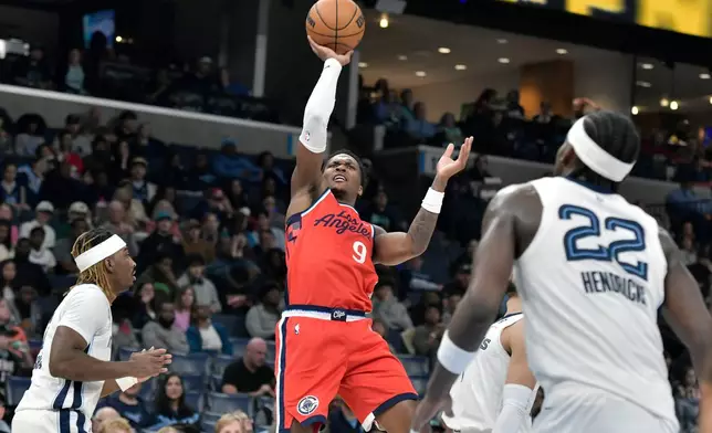 Los Angeles Clippers guard Bennedict Mathurin (9) shoots against the Memphis Grizzlies in the first half of an NBA basketball game Saturday, March 7, 2026, in Memphis, Tenn. (AP Photo/Brandon Dill)