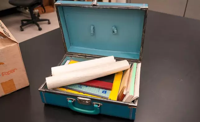 This photo provided by the Mississippi Department of Archives &amp; History shows a briefcase containing Ku Klux Klan-related items, Thursday, March 19, 2026, in Jackson, Miss., found inside a closet in the Mississippi Department of Public Safety as employees were preparing to move. (Mississippi Department of Archives &amp; History via AP)