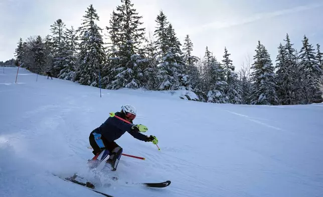 Melanie De Bona skis during training in Lans-en-Vercors, near Grenoble, France, Friday, Feb. 13, 2026. (AP Photo/Laurent Cipriani)
