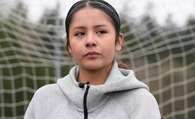 Valeria Hernandez tears up during an interview with the Associated Press at a soccer tournament for immigrant and refugee girls on Sunday, March 29, 2026, in Portland, Ore. (AP Photo/Jenny Kane)