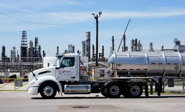 FILE - A truck passes LyondellBasell Houston Refinery on March 17, 2026, in Houston. (AP Photo/Ashley Landis, File)