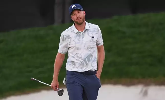 Daniel Berger reacts after his hit on the 18th hole during his playoffs against Akshay Bhatia at the Arnold Palmer Invitational at Bay Hill golf tournament Sunday, March 8, 2026, in Orlando, Fla. (AP Photo/Matt Slocum)