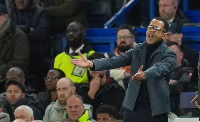 Chelsea's head coach Liam Rosenior reacts during the Champions League soccer match between Chelsea and Paris Saint-Germain in London, England, Tuesday, March 17, 2026. (AP Photo/Kin Cheung)