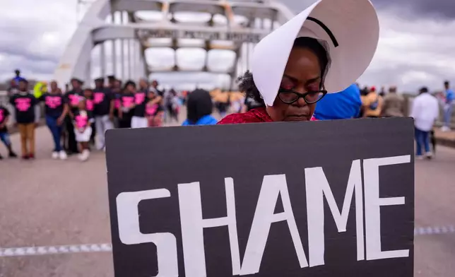 People march on the 61st Bloody Sunday Anniversary, Sunday, March 8, 2026, in Selma, Ala. (AP Photo/Mike Stewart)