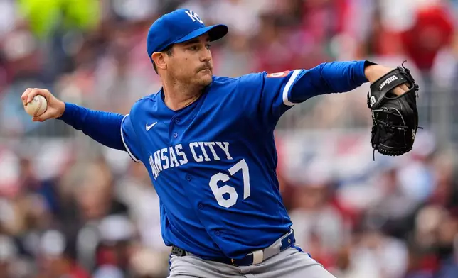 Kansas City Royals pitcher Seth Lugo (67) works against the Atlanta Braves in the first inning of a baseball game, Sunday, March 29, 2026, in Atlanta. (AP Photo/Mike Stewart)
