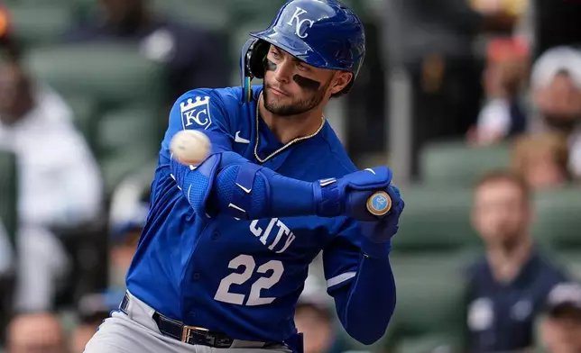 Kansas City Royals' Carter Jensen (22) takes a strike against the Atlanta Braves in the second inning of a baseball game, Sunday, March 29, 2026, in Atlanta. (AP Photo/Mike Stewart)