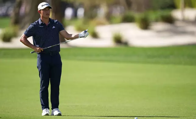 Collin Morikawa lines up hit shot on the first hole during the first round of the Arnold Palmer Invitational at Bay Hill golf tournament Thursday, March 5, 2026, in Orlando, Fla. (AP Photo/Matt Slocum)