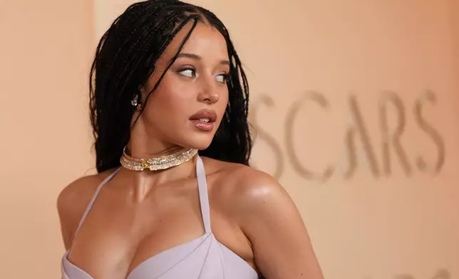 Chase Infiniti arrives at the Oscars on Sunday, March 15, 2026, at the Dolby Theatre in Los Angeles. (AP Photo/Gregory Bull)