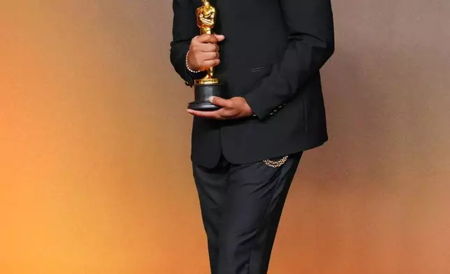 Michael B. Jordan, winner of the award for actor in a leading role for "Sinners," poses in the press room at the Oscars on Sunday, March 15, 2026, at the Dolby Theatre in Los Angeles. (Photo by Jordan Strauss/Invision/AP)