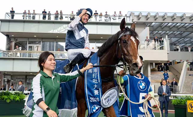 Hugh Bowman celebrates a third BMW Hong Kong Derby triumph. Photo source: HKJC