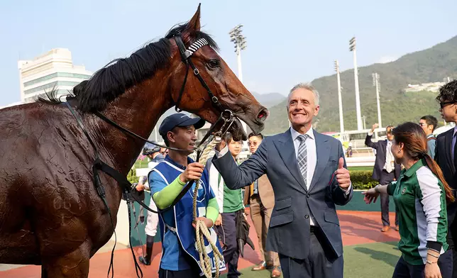 Mark Newnham jubilates in his most important training success. Photo source: HKJC