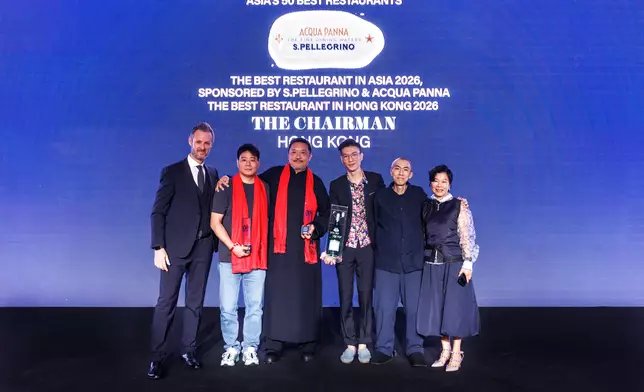 The team from top local Cantonese restaurant The Chairman accept the top prize on stage at the Asia’s 50 Best Restaurants 2026 Awards.